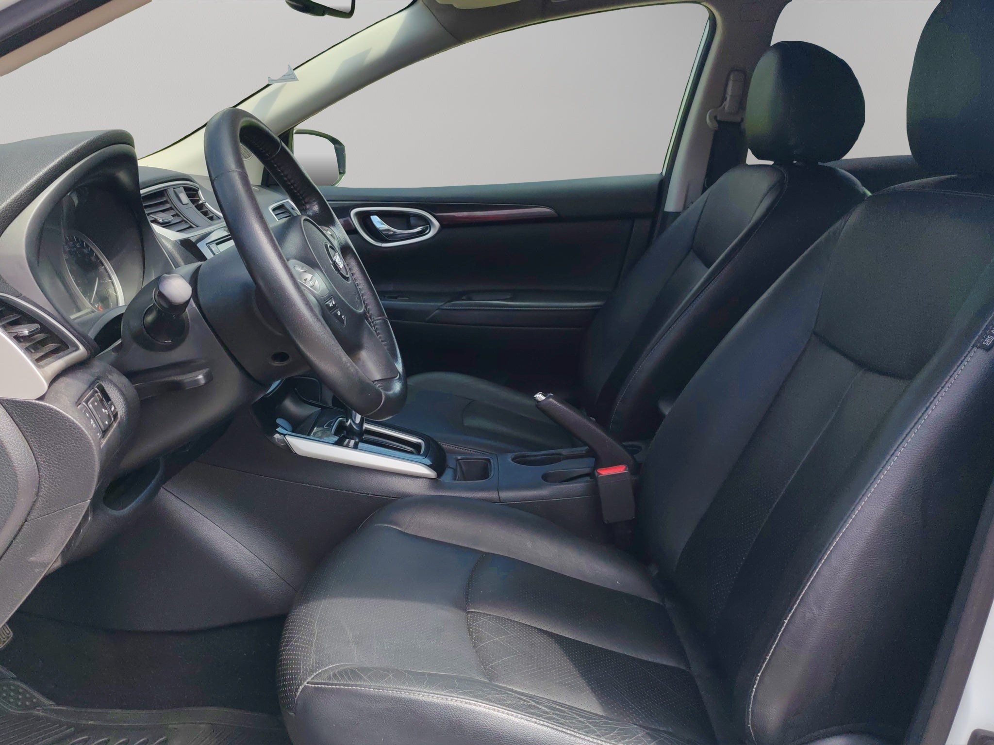 2019 Nissan Sentra 4 pts. Exclusive, TA, a/ac. Aut., piel, QC, GPS, f. led, RA-17 (línea anterior)