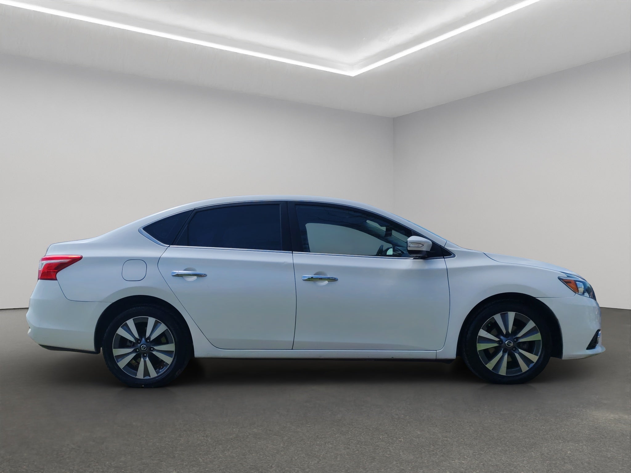 2019 Nissan Sentra 4 pts. Exclusive, TA, a/ac. Aut., piel, QC, GPS, f. led, RA-17 (línea anterior)