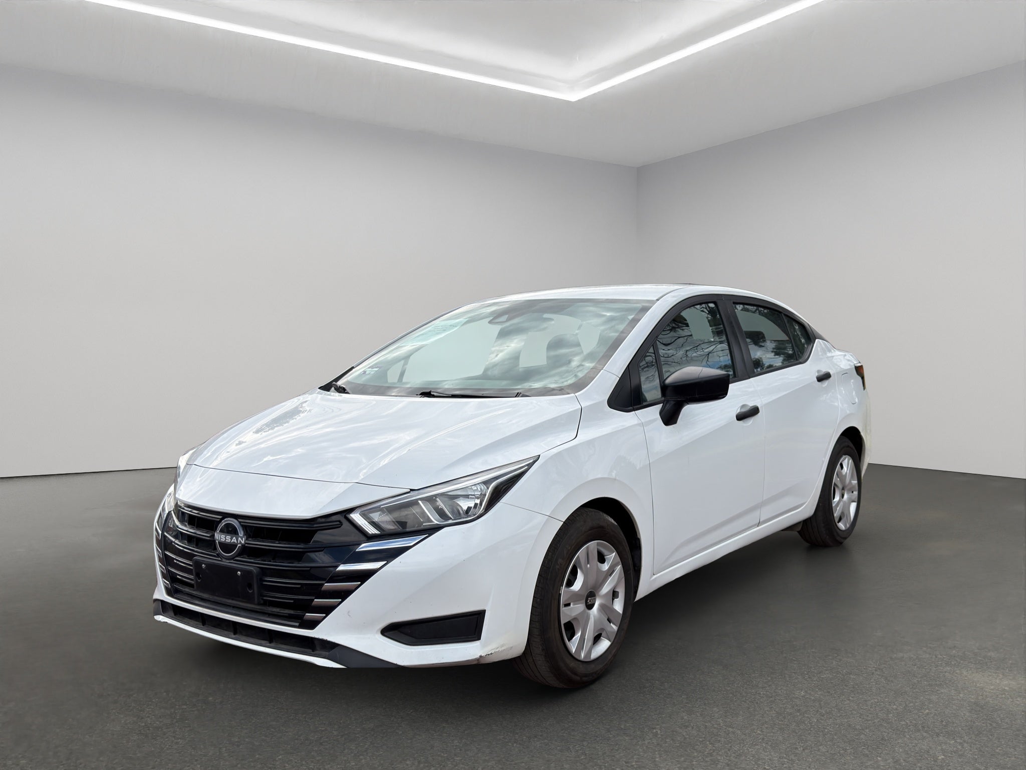 2024 Nissan Versa 4 pts. Sense, TM5, a/ac., R-15