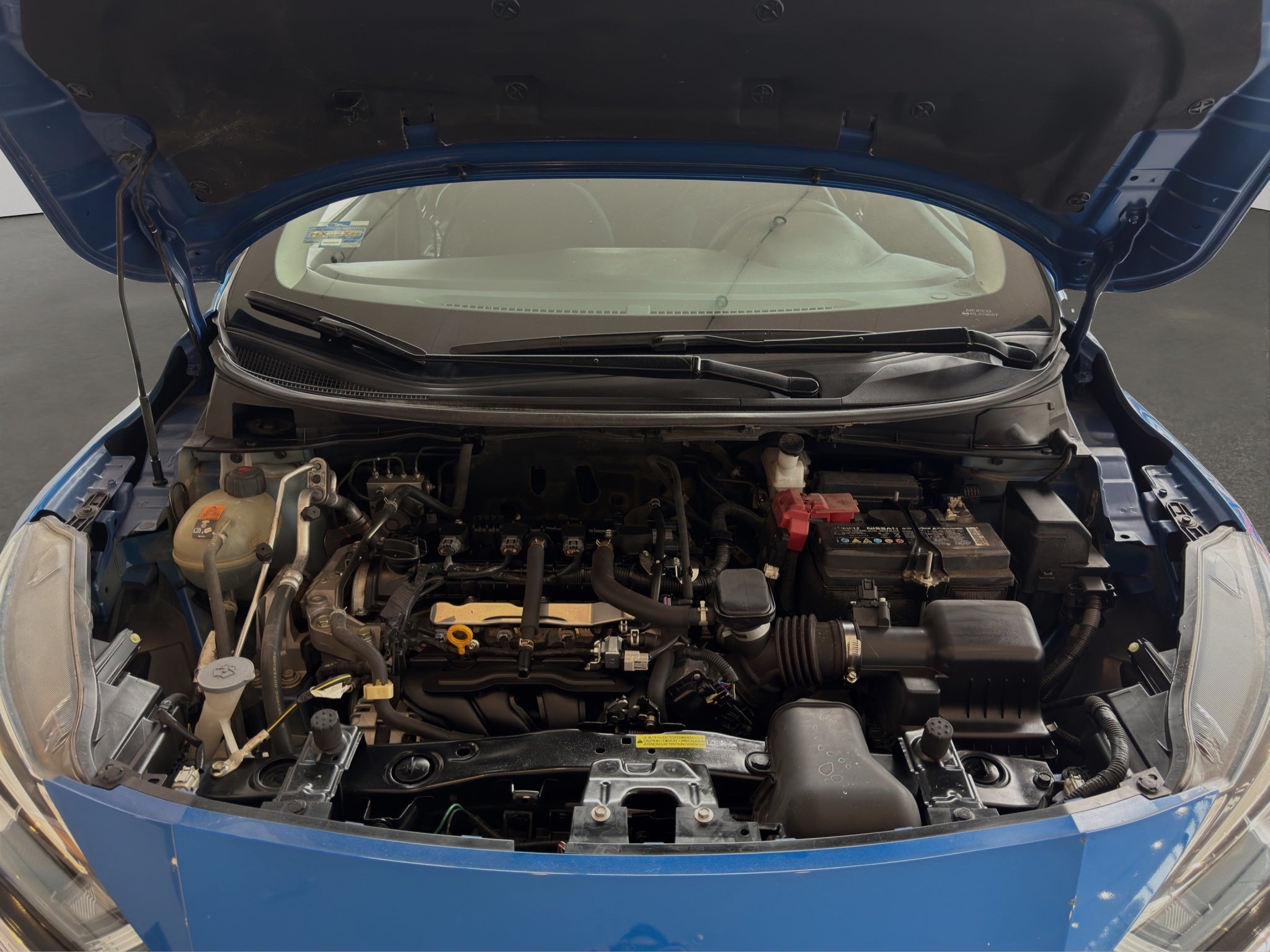 2024 Nissan Versa 4 pts. Sense, TM5, a/ac., R-15