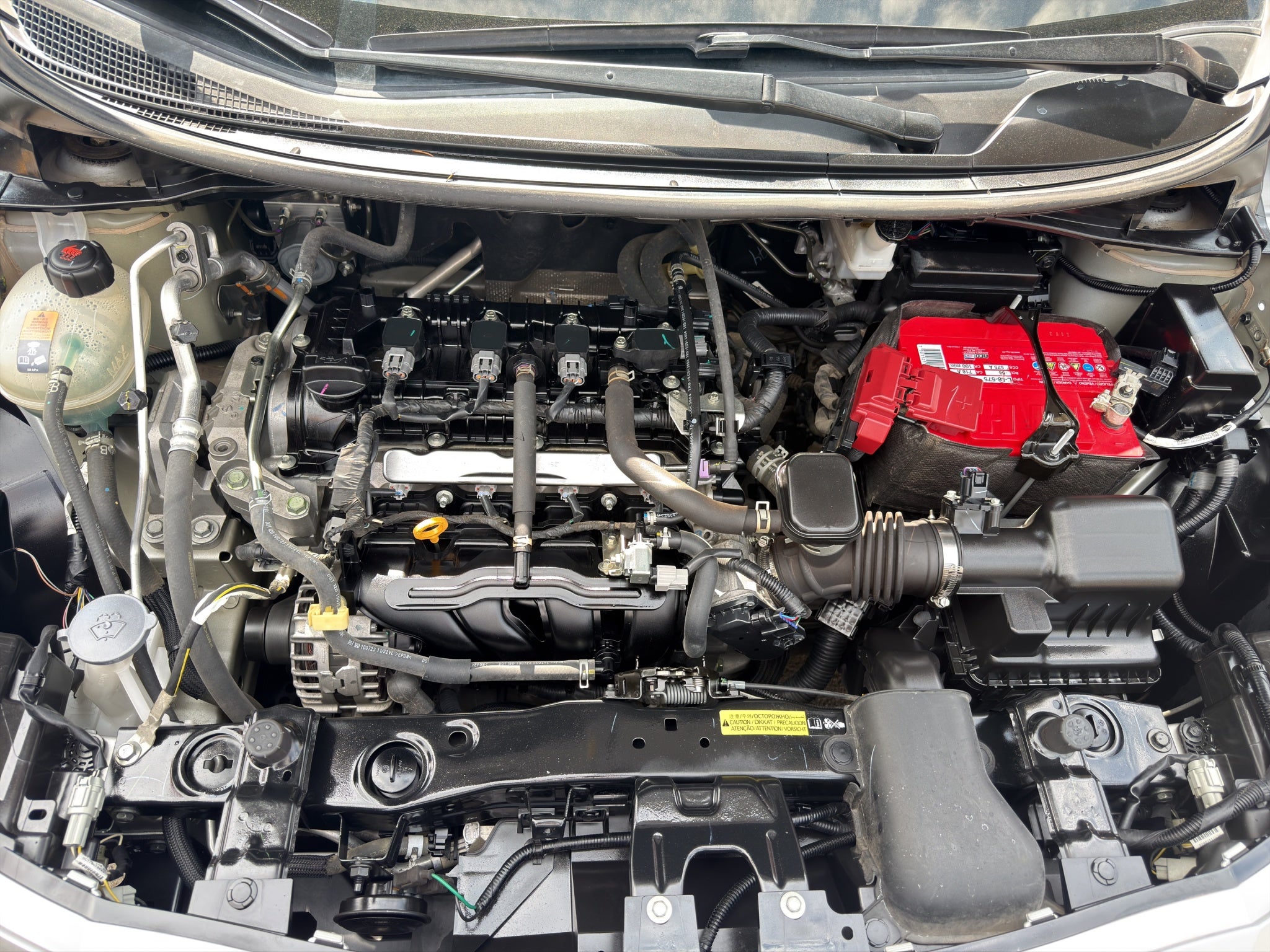 2024 Nissan Versa 4 pts. Sense, TM5, a/ac., R-15