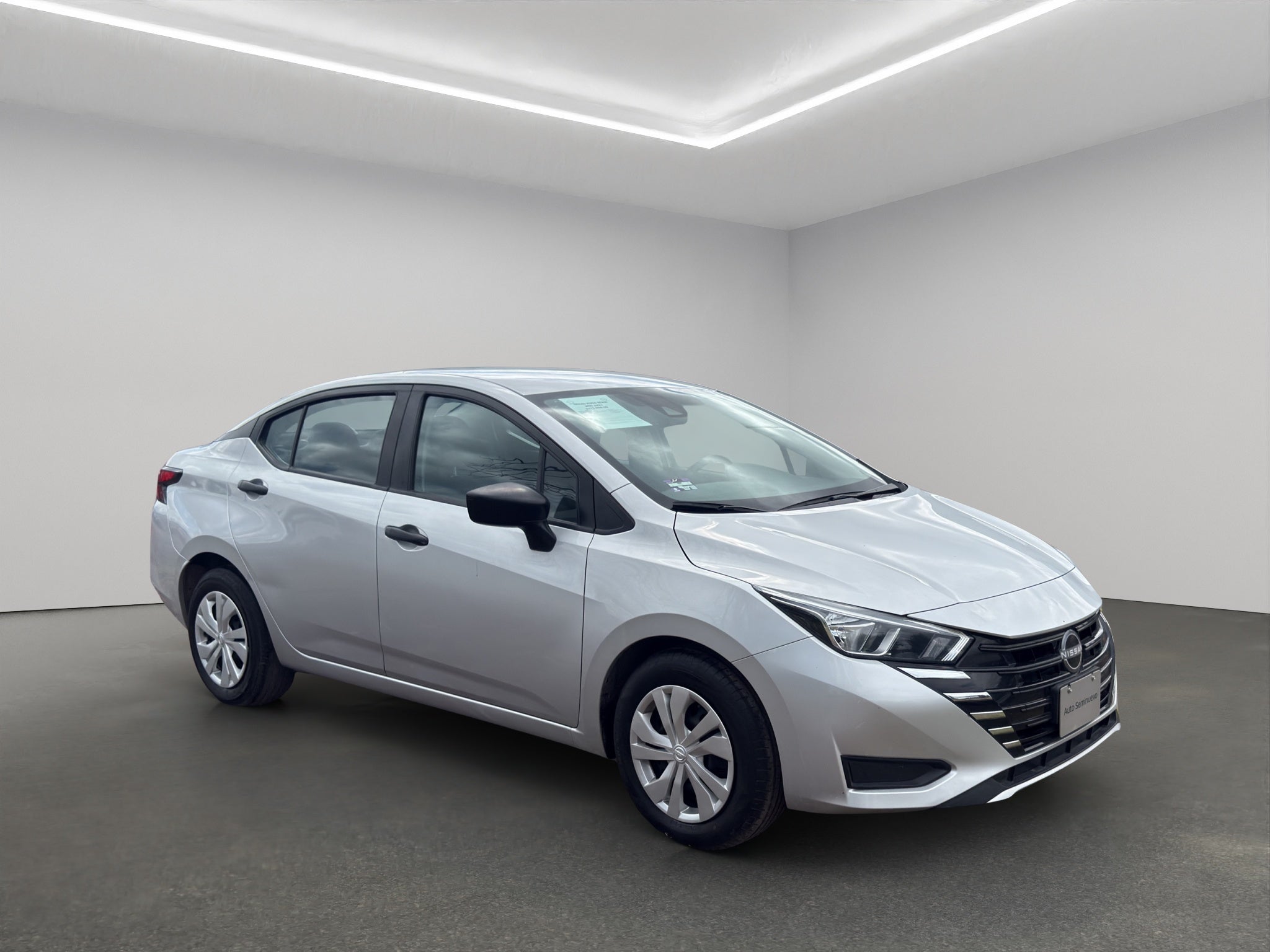 2024 Nissan Versa 4 pts. Sense, TM5, a/ac., R-15